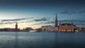 Skyline of Stockholm during sunset with Riddarholmskyrkan church and Stadshus on Gamla Stan old town island in Sweden