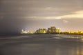 Skyline of Sunny Isles Beach by night with reflections at the surface of the ocean Royalty Free Stock Photo