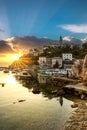 Skyline of the town of Vrbnik on the island of Krk, Croatia. Harbor and mountain village at sunrise