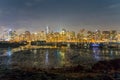 Skyline of Vancouver by night seen from Stanley park Royalty Free Stock Photo