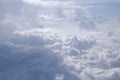 Beautiful cloudy sky from aerial view background. Airplane view above clouds. Sky and cloud texture Royalty Free Stock Photo