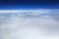 Skyline View above the Clouds from air plane Royalty Free Stock Photo