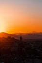 Skyline view at a city in tuscany at sunset