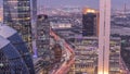 Skyline view of the high-rise buildings in International Financial Centre in Dubai aerial day to night timelapse, UAE. Royalty Free Stock Photo