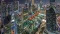 Skyline view of the high-rise buildings on Sheikh Zayed Road in Dubai aerial day to night timelapse, UAE. Royalty Free Stock Photo