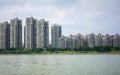 A beautiful skyline view of a typical apartments in China by the river
