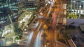 Skyline view of traffic on Al Saada street near DIFC district night timelapse in Dubai, UAE. Royalty Free Stock Photo