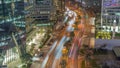 Skyline view of traffic on Al Saada street near DIFC district night timelapse in Dubai, UAE. Royalty Free Stock Photo
