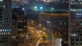 Skyline view of traffic on Al Saada street near DIFC district night to day timelapse in Dubai, UAE. Royalty Free Stock Photo