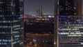 Skyline view of traffic on Al Saada street near financial district night timelapse in Dubai, UAE. Royalty Free Stock Photo