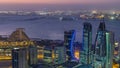 The skyline of the West Bay area from top in Doha night to day timelapse, Qatar. Royalty Free Stock Photo