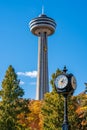 Skylon Tower, Niagara Falls Rotary Clock, autumn maple leaf over blue sky. Fall foliage. Royalty Free Stock Photo