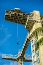 Bungee jump off the 47 meter high Skypark Sentosa Bungy tower in Singapore.