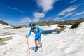 Skyrunner man in action going uphill on snow Royalty Free Stock Photo