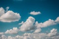 Skys canvas vivid blue sky adorned with fluffy white clouds