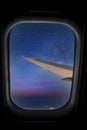 Skyscape through aeroplane window during flight