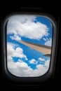 Skyscape through aeroplane window during flight