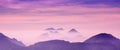 Skyscape view of cold purple mountains with mist and fog close to Quetzaltenango