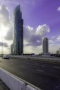 Skyscaper with blue sky and some ray light in background