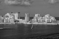 Skyscrapers over coast in Malta in greyscale.