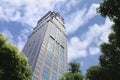 Skyscraper against a blue cloudy sky, Shanghai, China