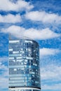 Skyscraper, blue sky with clouds. City, building Royalty Free Stock Photo