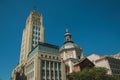 Skyscraper and church facade with dome in Madrid