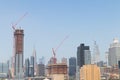 Skyscraper Construction in Long Island City Queens New York with the Manhattan Skyline in the Background Royalty Free Stock Photo