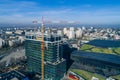 Skyscraper construction with working crane Royalty Free Stock Photo