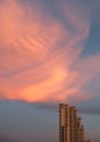 Skyscraper on evening cloudscape