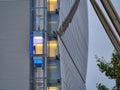 Skyscraper external elevator with persons silhouette inside