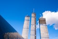 Skyscraper glass facades on a bright sunny day with sunbeams in the blue sky. Economy, finances, business development activity con Royalty Free Stock Photo