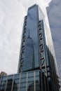 Skyscraper in Manhattan, New York, reflecting the Freedom Tower, One World Trade Center in its glass windows