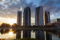 Skyscrapers in sunset at Putrajaya, Malaysia. Building reflecting in the lake Royalty Free Stock Photo