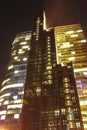 Skyscraper skyscraper tall building at night illuminated with office lights