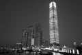 Skyscraper in Victoria harbor of Hong Kong city at dusk in monochrome Royalty Free Stock Photo