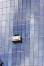 Skyscraper windows washers Royalty Free Stock Photo