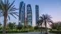 Skyscrapers of Abu Dhabi with Etihad Towers buildings day to night . Royalty Free Stock Photo