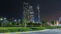 Skyscrapers of Abu Dhabi at night with Etihad Towers buildings . Royalty Free Stock Photo