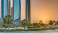 Skyscrapers of Abu Dhabi at sunset with Etihad Towers buildings . Royalty Free Stock Photo