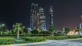 Skyscrapers of Abu Dhabi at night with Etihad Towers buildings timelapse hyperlapse. Royalty Free Stock Photo