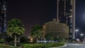 Skyscrapers of Abu Dhabi at night with Etihad Towers buildings timelapse. Royalty Free Stock Photo