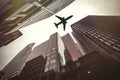 Skyscrapers and airplane. Air safety Royalty Free Stock Photo