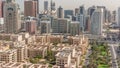 Skyscrapers in Barsha Heights district and low rise buildings in Greens district aerial all day timelapse. Dubai skyline Royalty Free Stock Photo