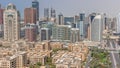 Skyscrapers in Barsha Heights district and low rise buildings in Greens district aerial all day timelapse. Dubai skyline Royalty Free Stock Photo