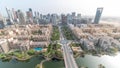 Skyscrapers in Barsha Heights district and low rise buildings in Greens district aerial timelapse. Dubai skyline Royalty Free Stock Photo