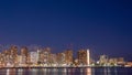 Skyscrapers on the beach of Waikiki in Honolulu, Hawaii at night Royalty Free Stock Photo