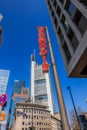 Skyscrapers with blue sky and lettering