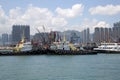 Group skyscrapers and boats in pier Hongkong Royalty Free Stock Photo