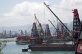 Skyscrapers and boats in pier Hongkong Royalty Free Stock Photo